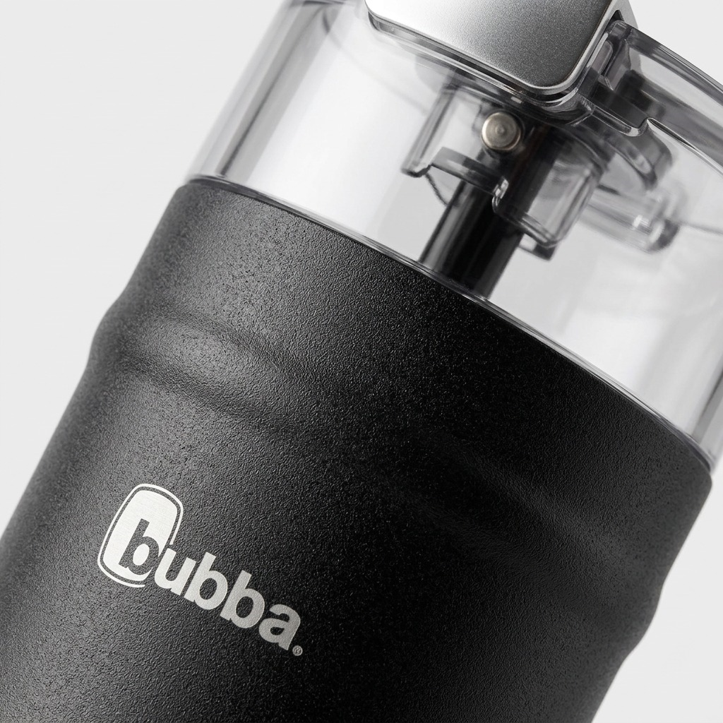 Extreme close-up of the textured matte finish and clear cap of the bubba DualSip bottle.
