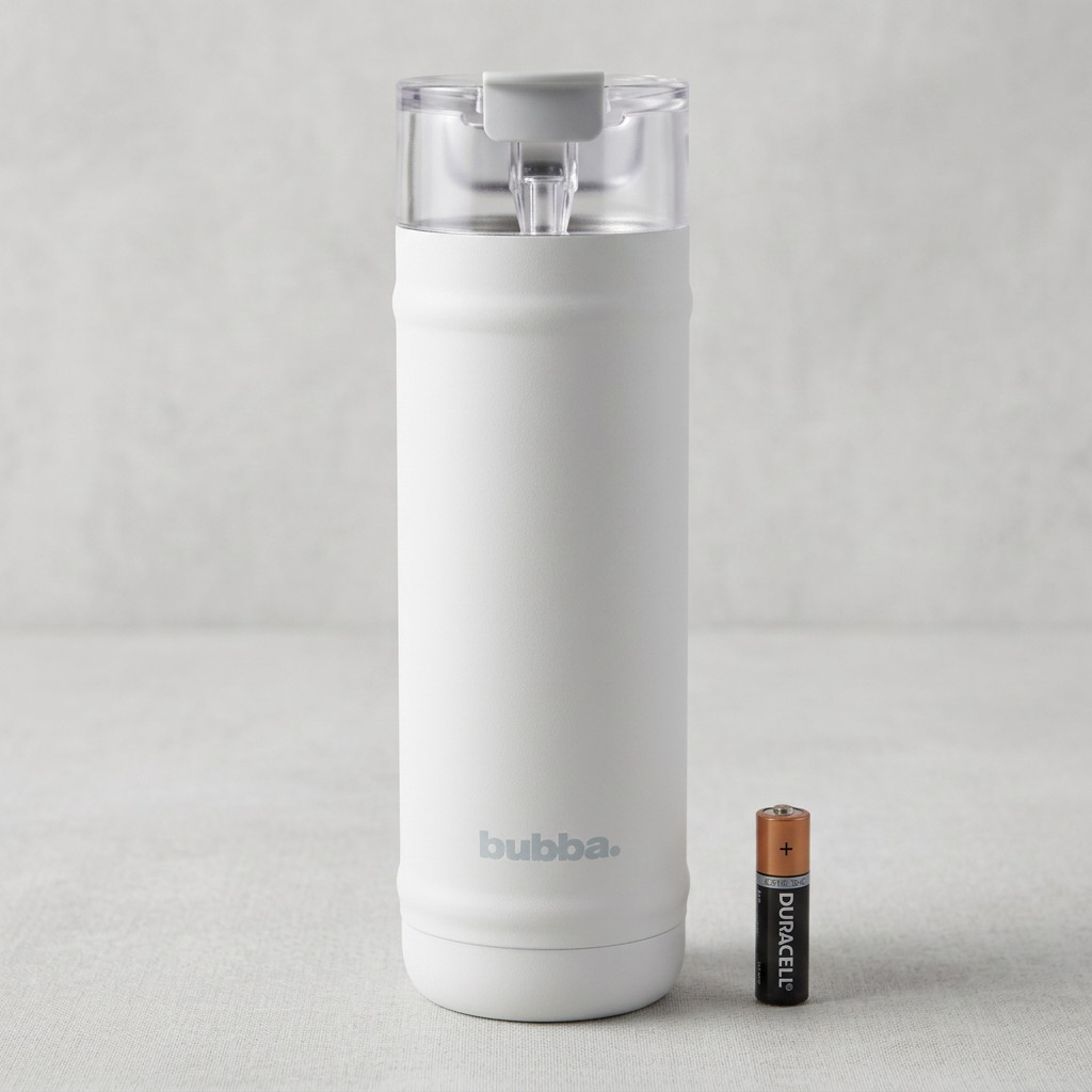 A scale-reference image of the specific 32 oz bubba insulation bottle next to a standard AA battery.